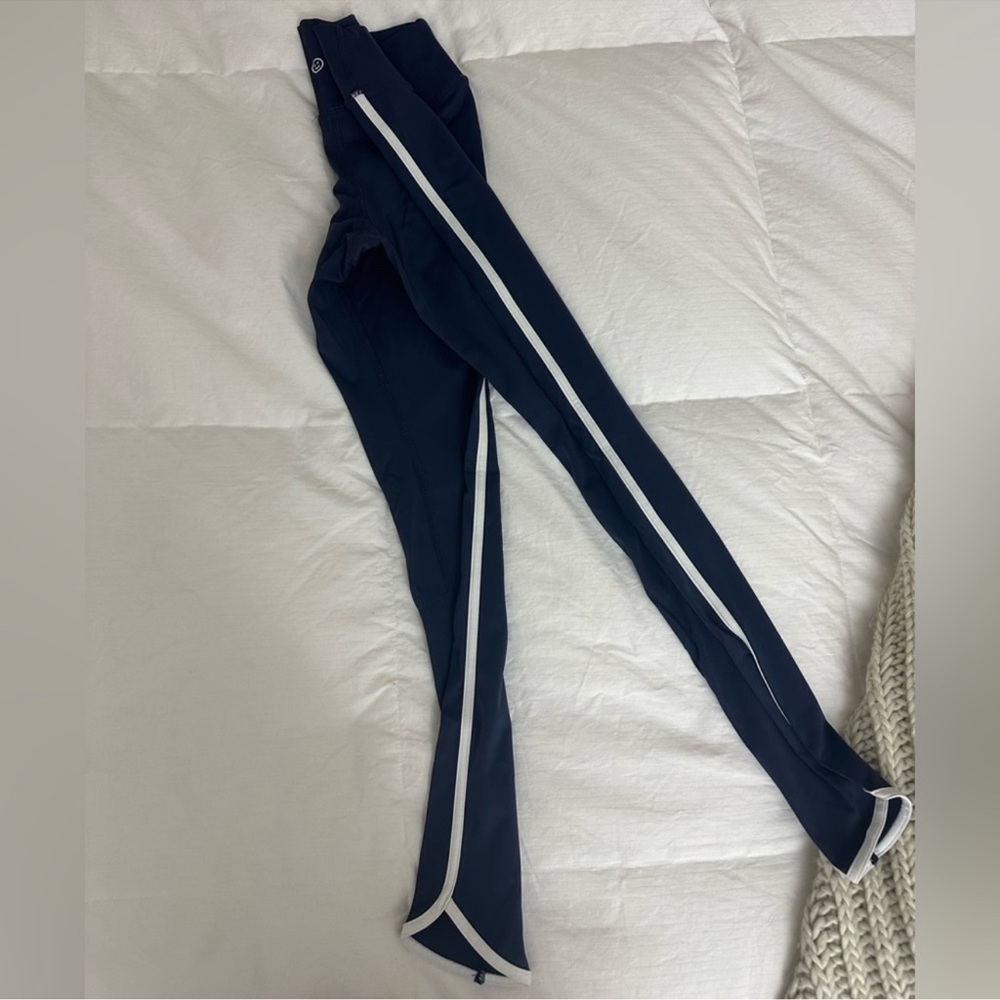 Gilly Hicks navy blue leggings with white stripe